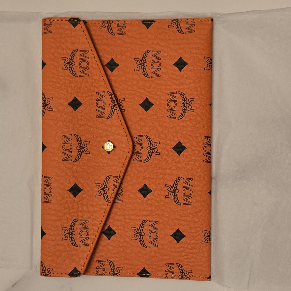 MCM Tan Logo Clutch